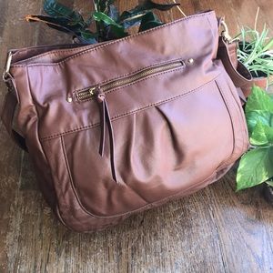 APT 9: brown bag with gold accents